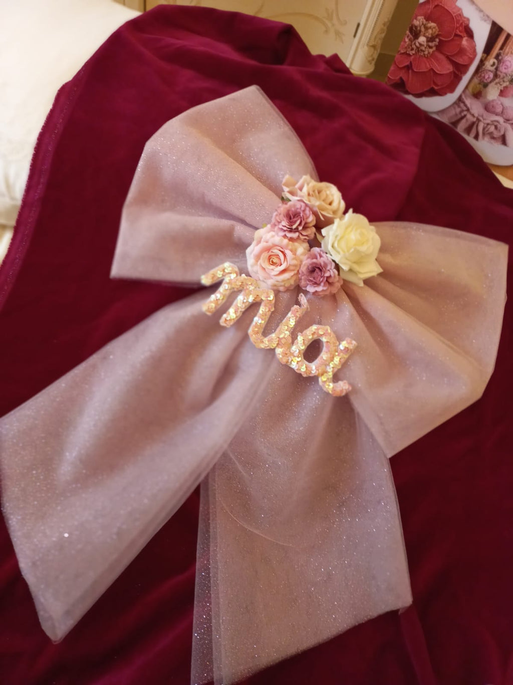 Fiocco nascita in tulle glitterato con nome personalizzato.